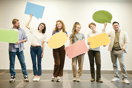 Team holding colorful donor appreciationspeech bubbles